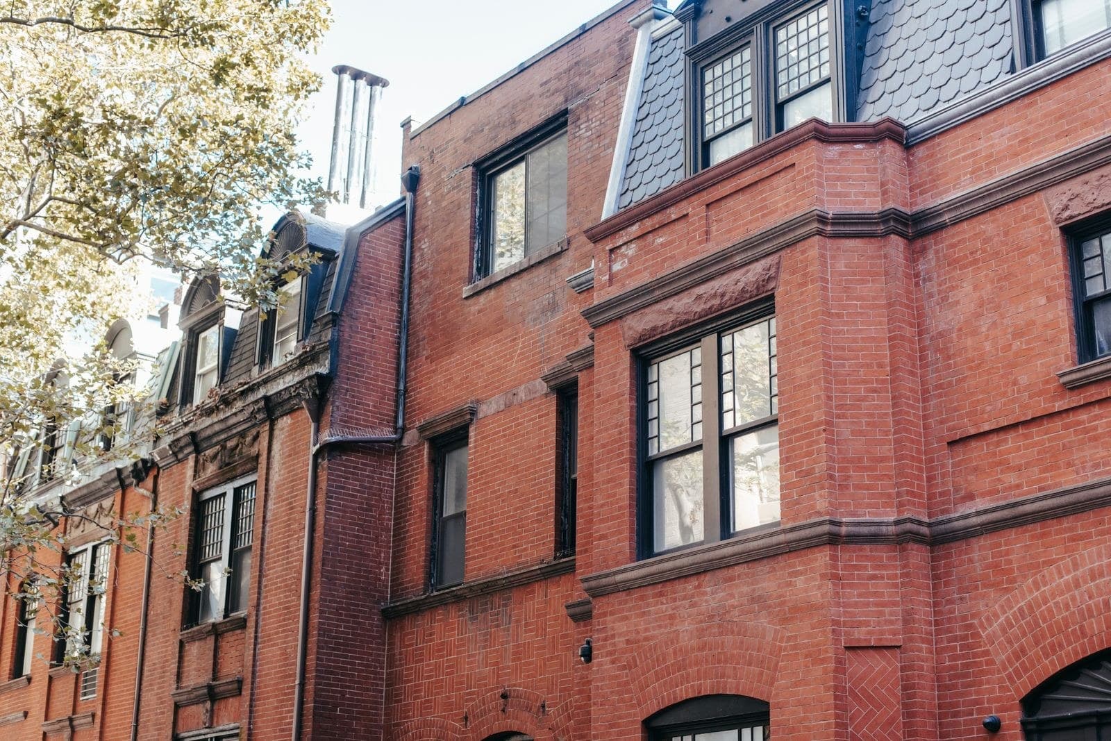 Victorian red brick row houses with bay windows